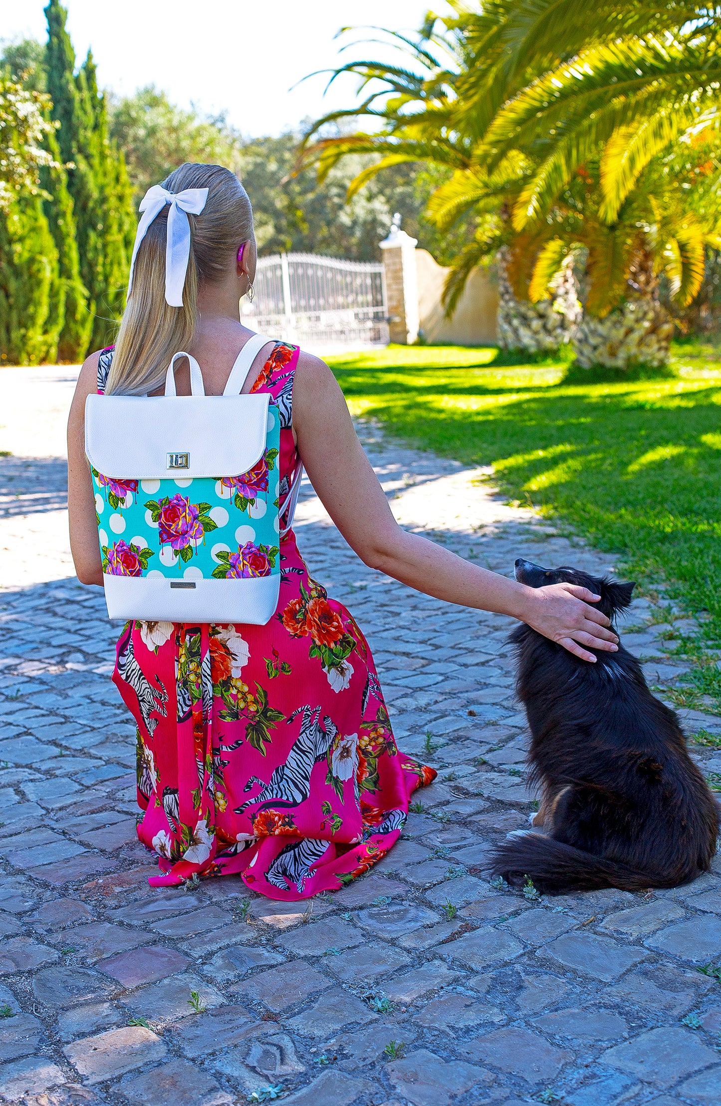 Bonn Backpack PDF sewing pattern in Tula Pink dripping roses fabric worn.